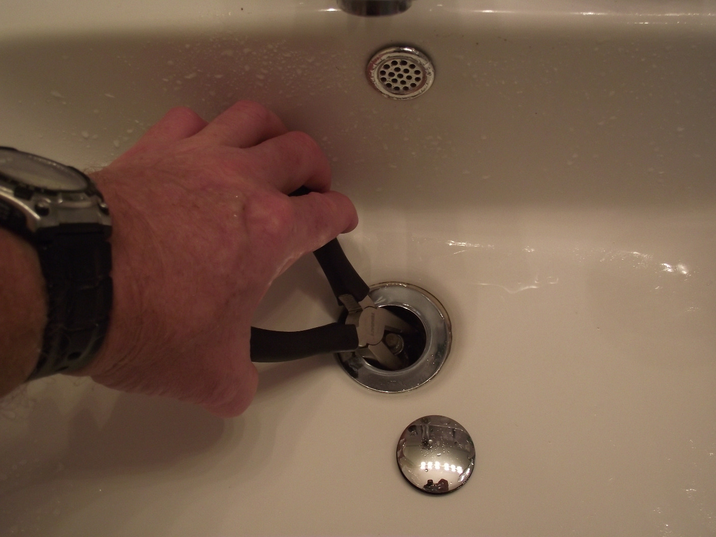 how to remove sink plug